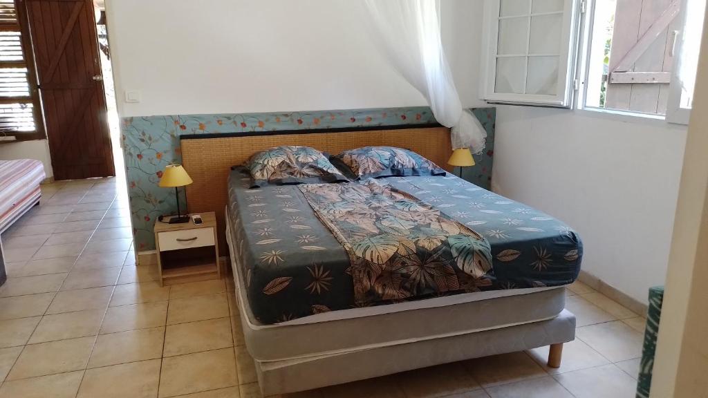 Postel nebo postele na pokoji v ubytování Kay Zanndoli