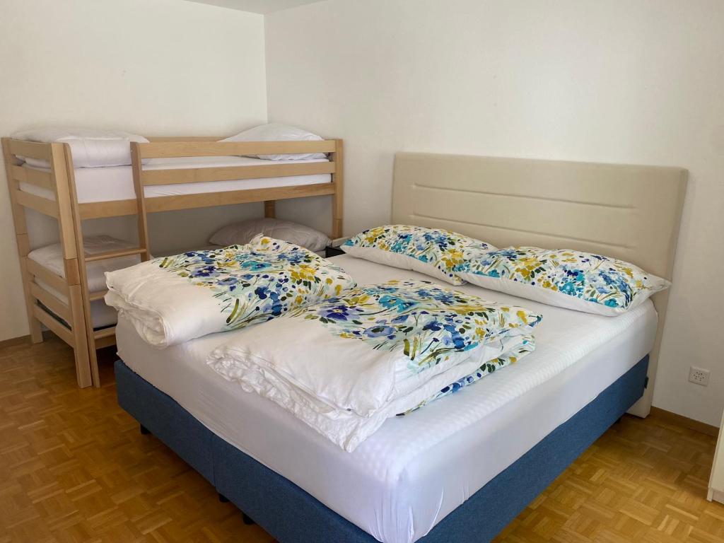 Postel nebo postele na pokoji v ubytování St. Moritz