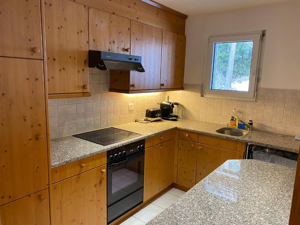Kuchyň nebo kuchyňský kout v ubytování St. Moritz