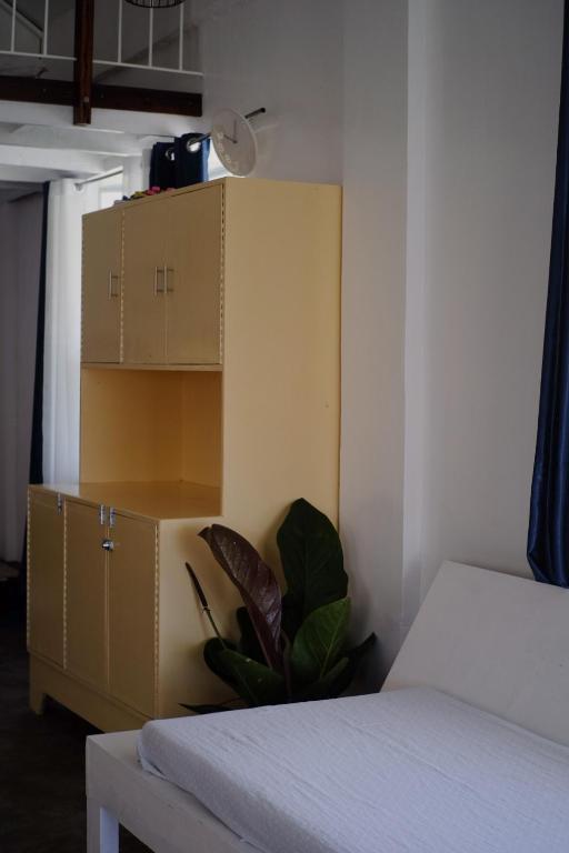 Postel nebo postele na pokoji v ubytování YAMA APARTMENTS - Private Beachfront