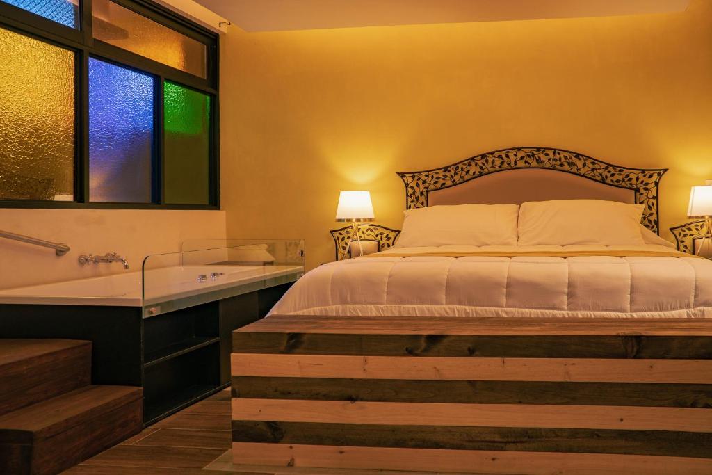 Postel nebo postele na pokoji v ubytování Hotel Tepeyac