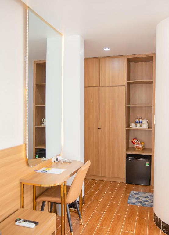Kuchyň nebo kuchyňský kout v ubytování SUNRISE Hotel Bạc Liêu