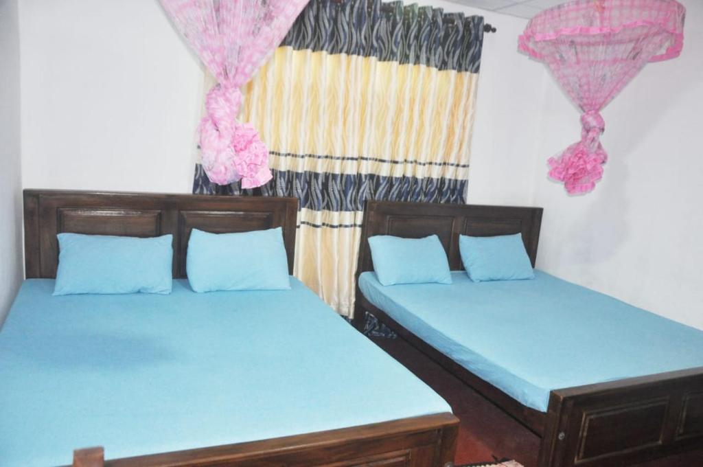 Postel nebo postele na pokoji v ubytování Impress Holiday Home