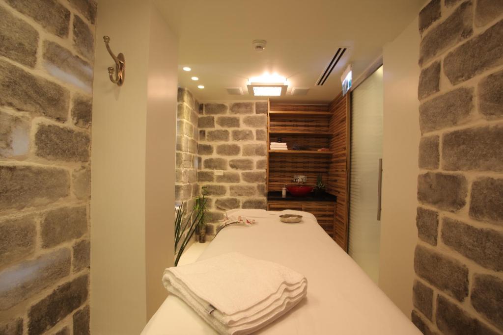 Postel nebo postele na pokoji v ubytování Bell Boutique and Spa Hotel