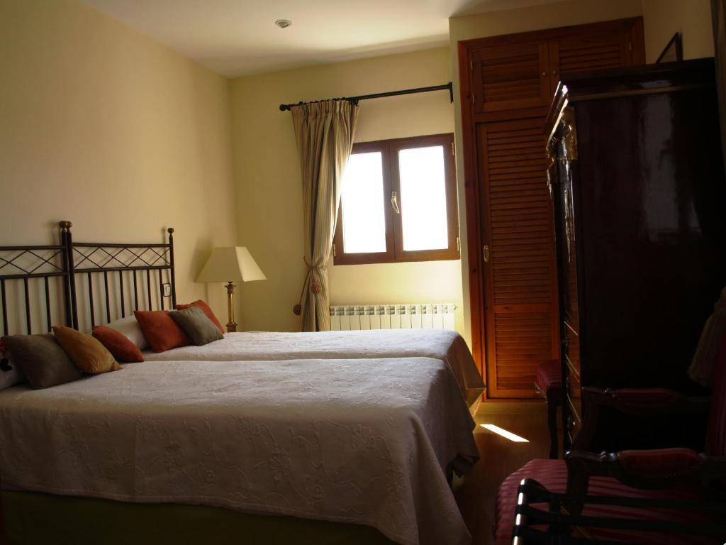 Cama o camas de una habitación en Residencia Real del Castillo de Curiel