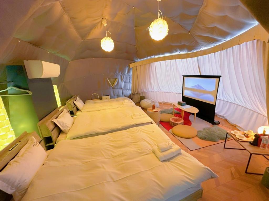 Letto o letti in una camera di Necoana Glamping