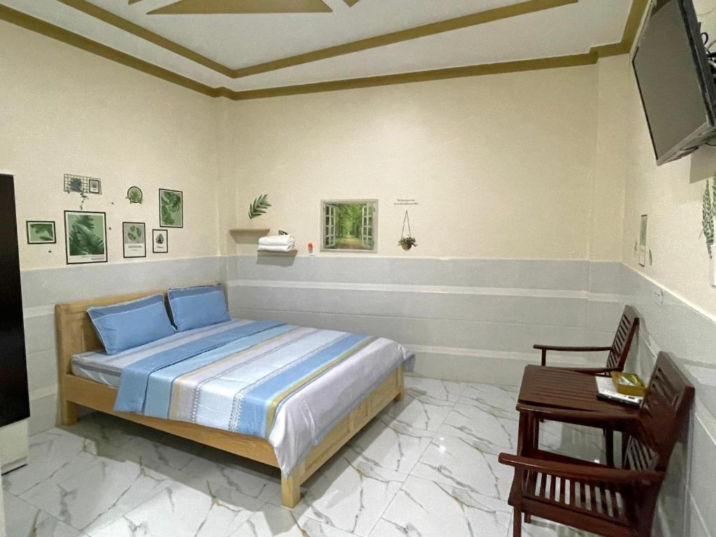 Giường trong phòng chung tại T'H Homestay