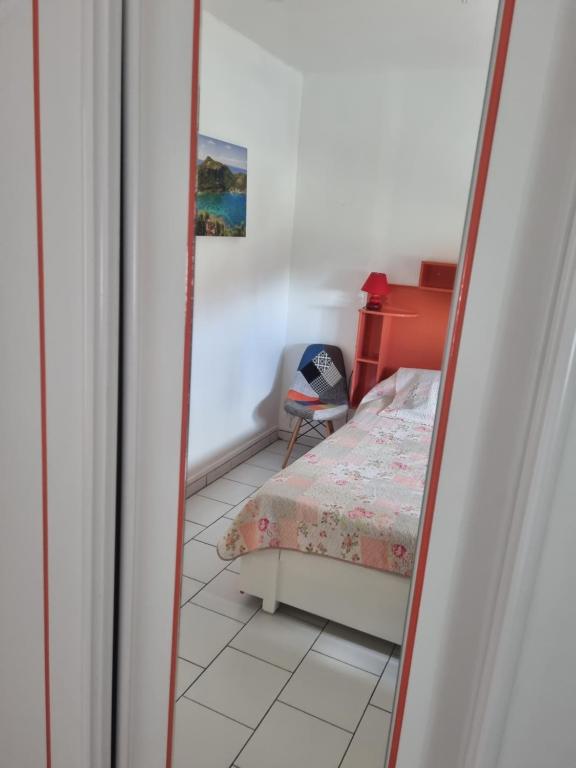 Postel nebo postele na pokoji v ubytování Accueil Créole