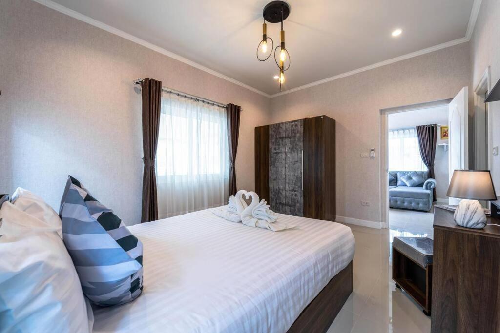 Postel nebo postele na pokoji v ubytování New 2 Bedroom Pool Villa C882
