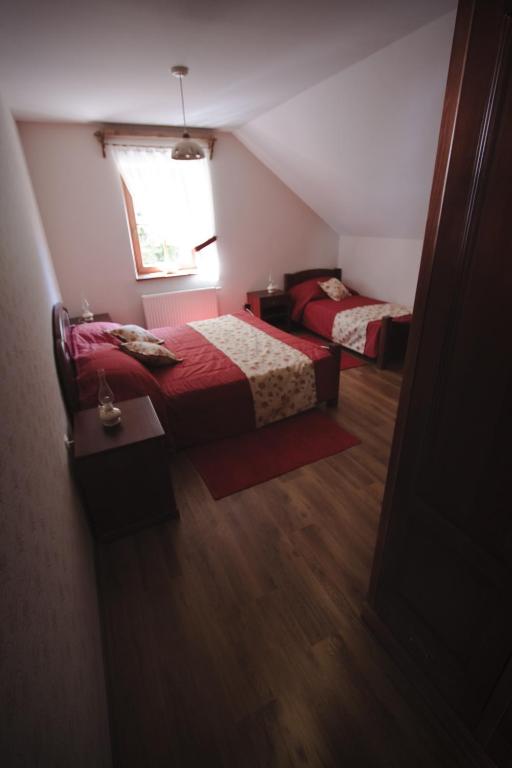 Postel nebo postele na pokoji v ubytování Merkež Guest House
