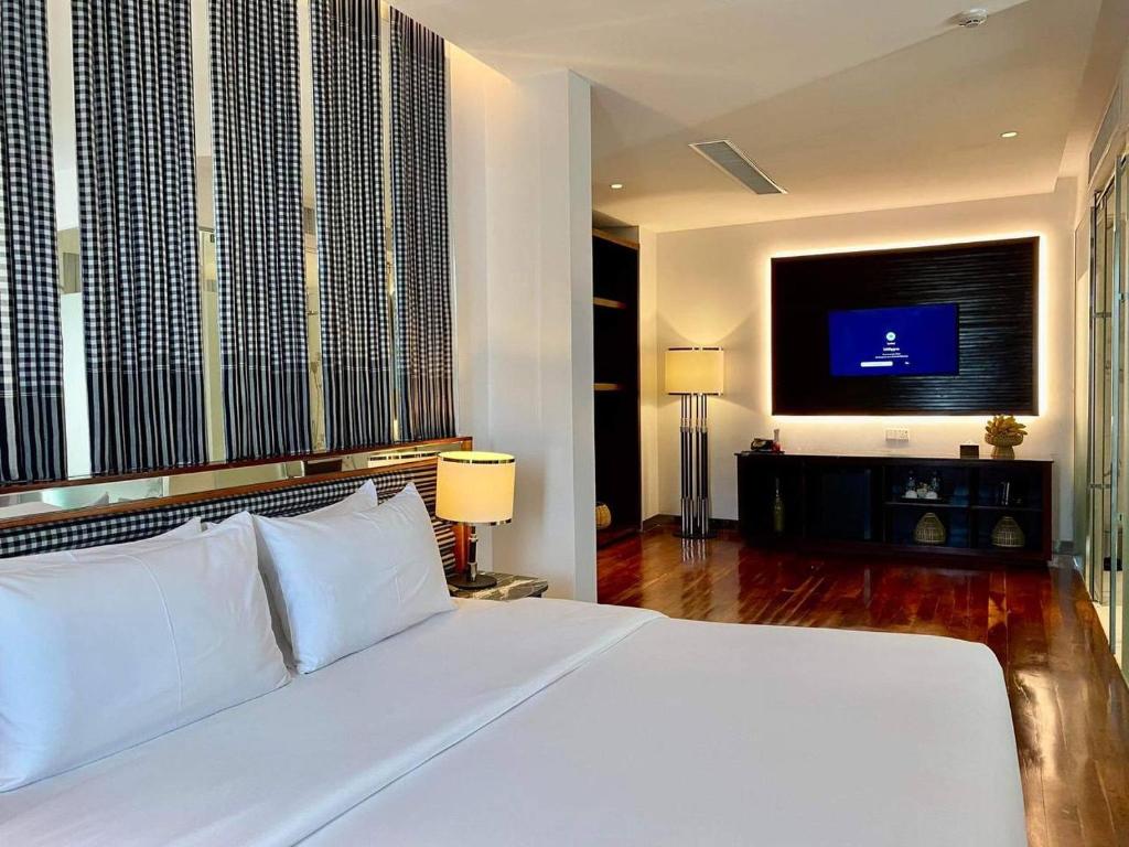 TV a/nebo společenská místnost v ubytování UTEY Hotel