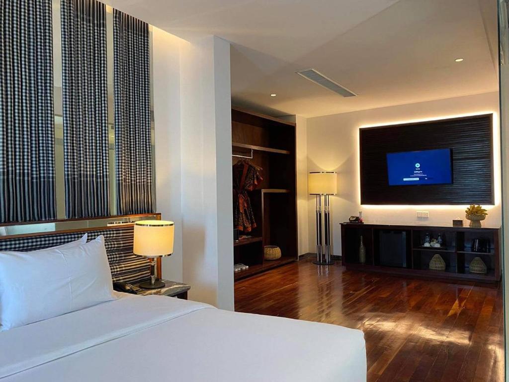 TV a/nebo společenská místnost v ubytování UTEY Hotel