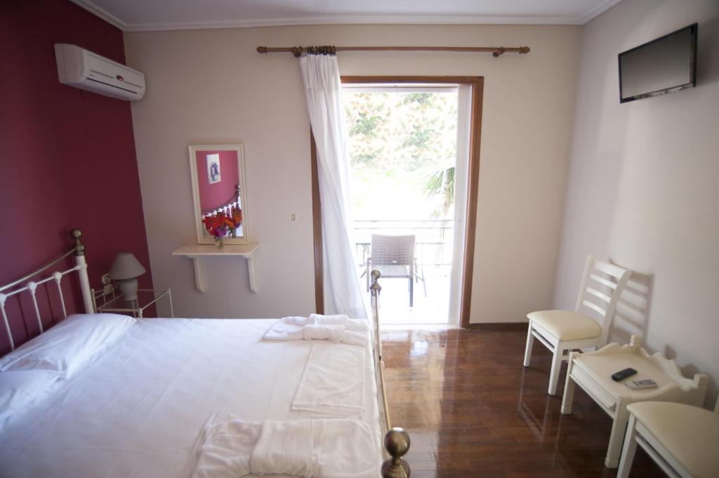 Booking.com: Giorgio Apartments , Nikiana, Grecia - 52 Comentarii de la  clienţi . Rezervaţi la hotel acum!