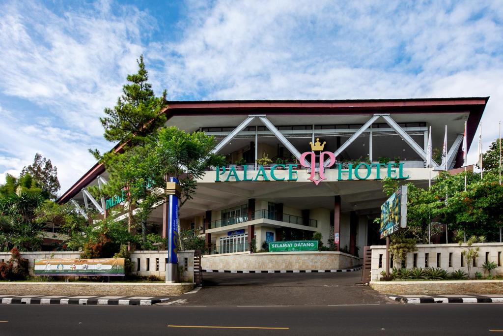a large building with a sign that reads palace hotel at Palace Hotel in Puncak