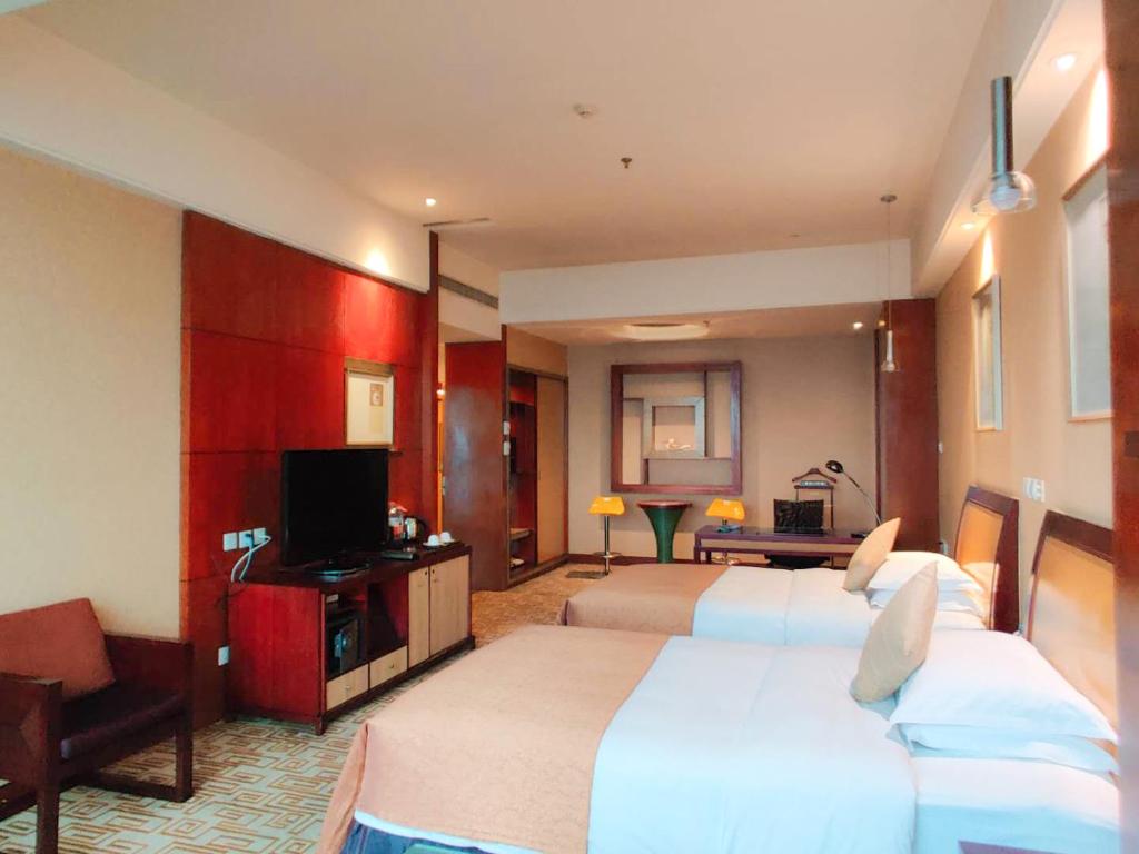 TV a/nebo společenská místnost v ubytování Empark Grand Hotel Kunming