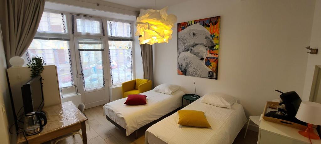 TV a/nebo společenská místnost v ubytování Chambre de charme à Saulieu
