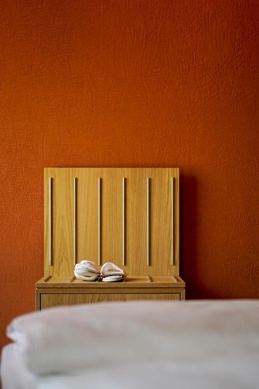 Postel nebo postele na pokoji v ubytování Hotel La Briosa