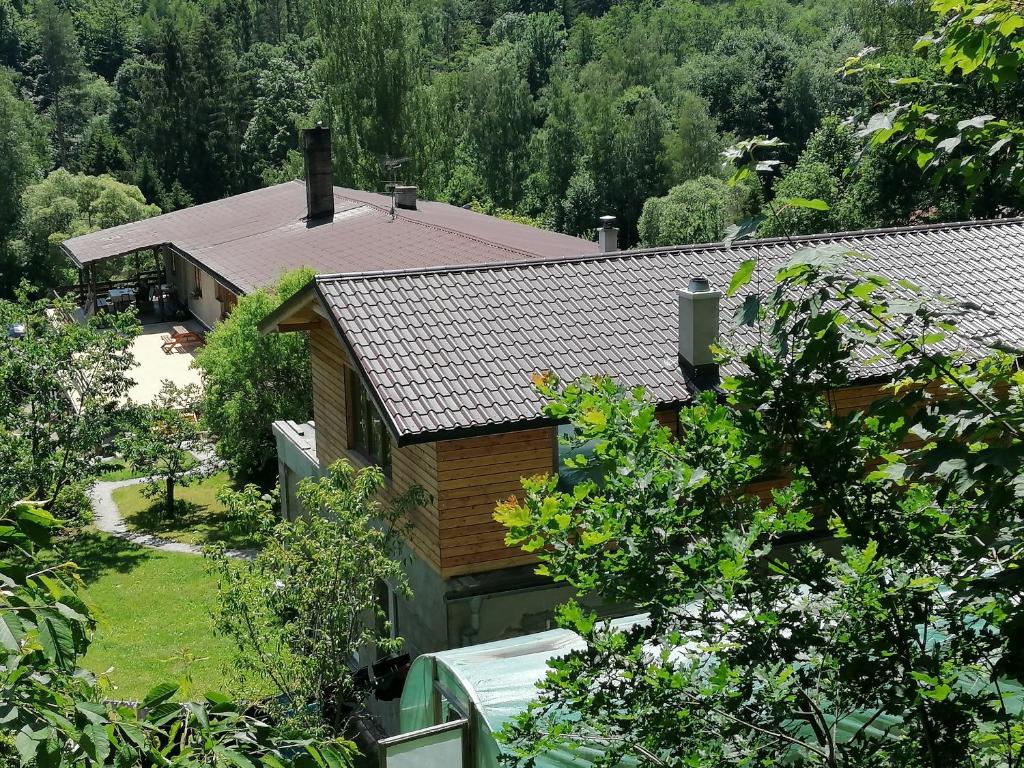 an aerial view of a house in the woods at Bydlinská zahrádka Těšíkov in Šternberk