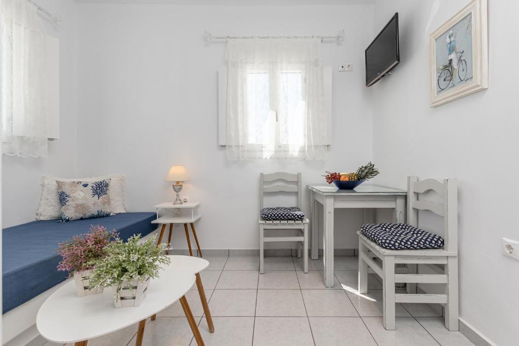 TV a/nebo společenská místnost v ubytování Zanneta Apartments & Suites