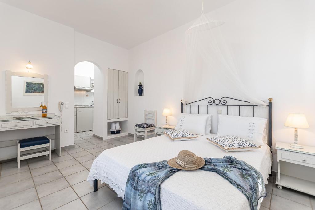 Postel nebo postele na pokoji v ubytování Zanneta Apartments & Suites
