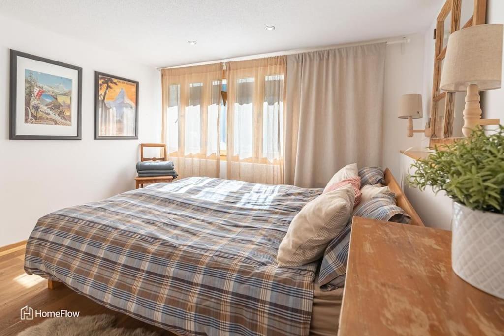 Postel nebo postele na pokoji v ubytování Comfortable apartment for 4-8 persons near Zermatt
