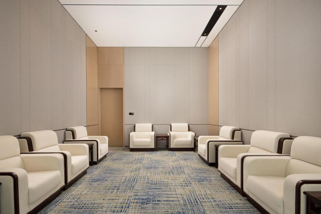 Posezení v ubytování Home2 Suites By Hilton Wuhan Xudong