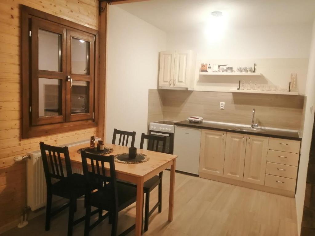 Kuchyň nebo kuchyňský kout v ubytování Vikendice Karamarković