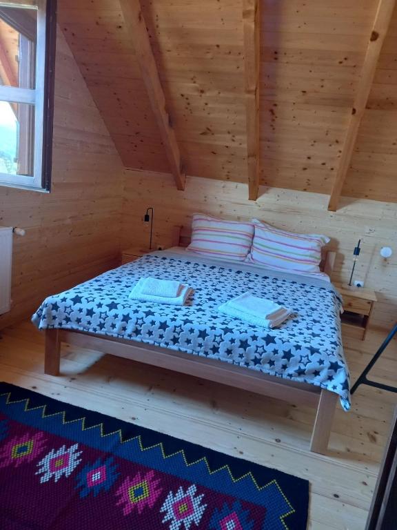 Postel nebo postele na pokoji v ubytování Vikendice Karamarković
