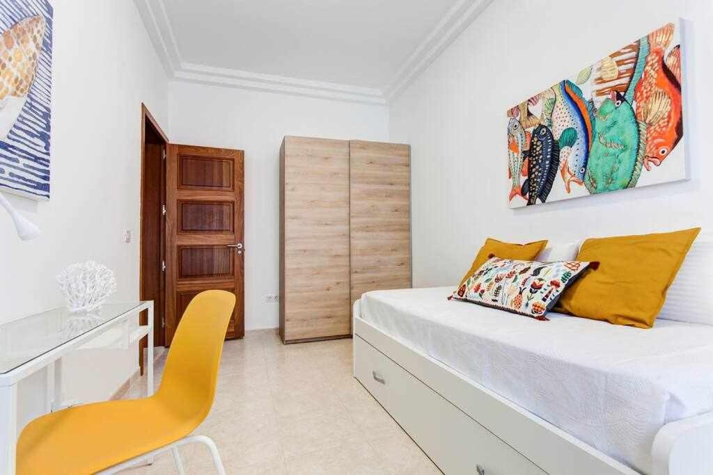 Postel nebo postele na pokoji v ubytování Homu Aura Fantástica villa con piscina privada