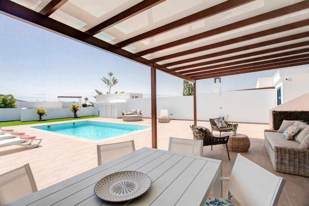 Bazén v ubytování Homu Aura Fantástica villa con piscina privada nebo v jeho okolí