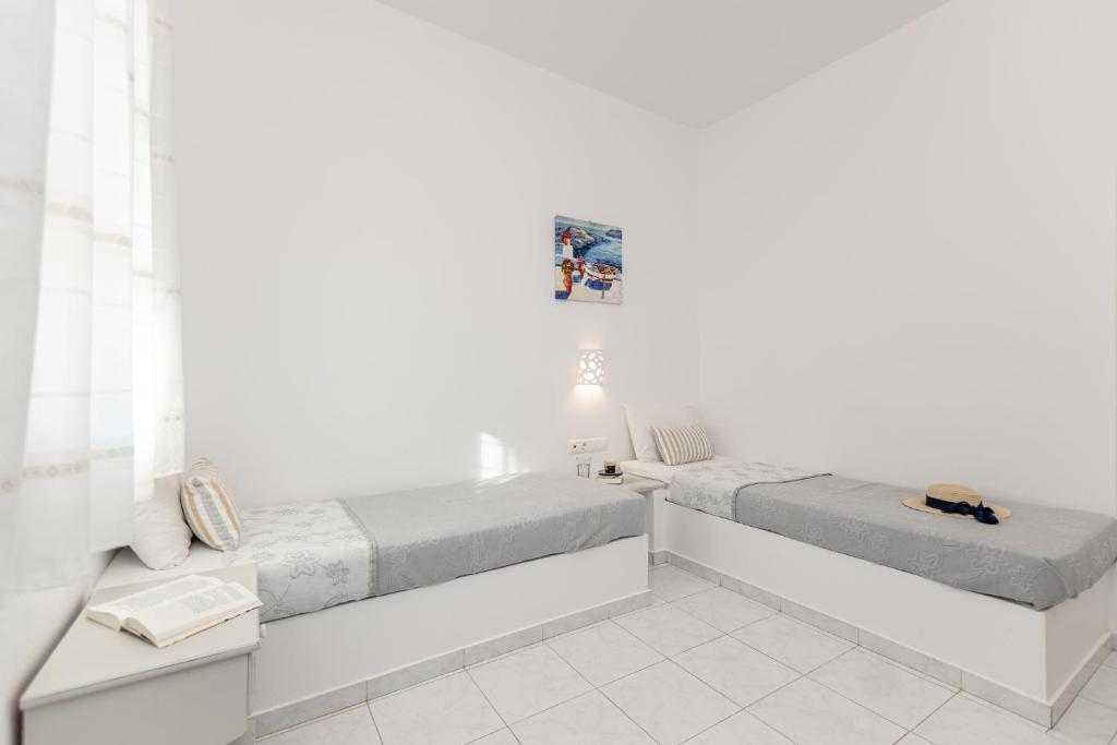 Posezení v ubytování Zanneta Apartments & Suites