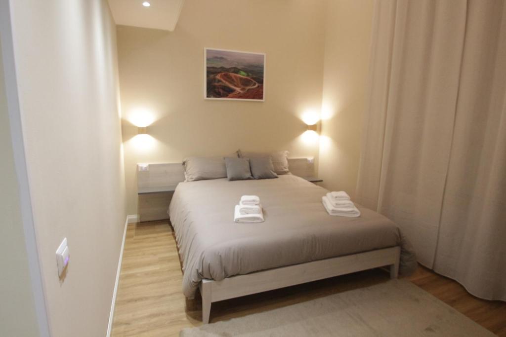 Postel nebo postele na pokoji v ubytování Etna Vibes Home