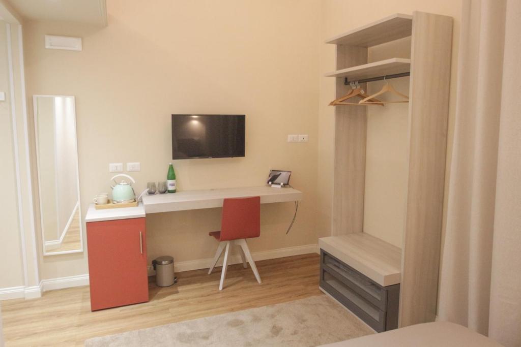 TV a/nebo společenská místnost v ubytování Etna Vibes Home