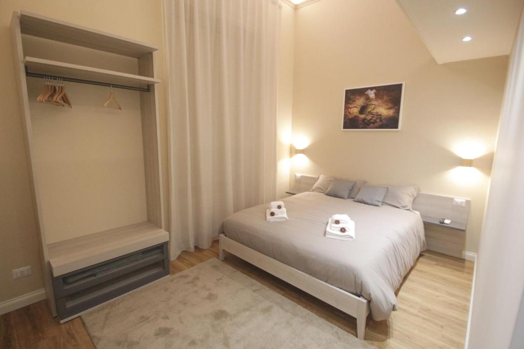 Postel nebo postele na pokoji v ubytování Etna Vibes Home