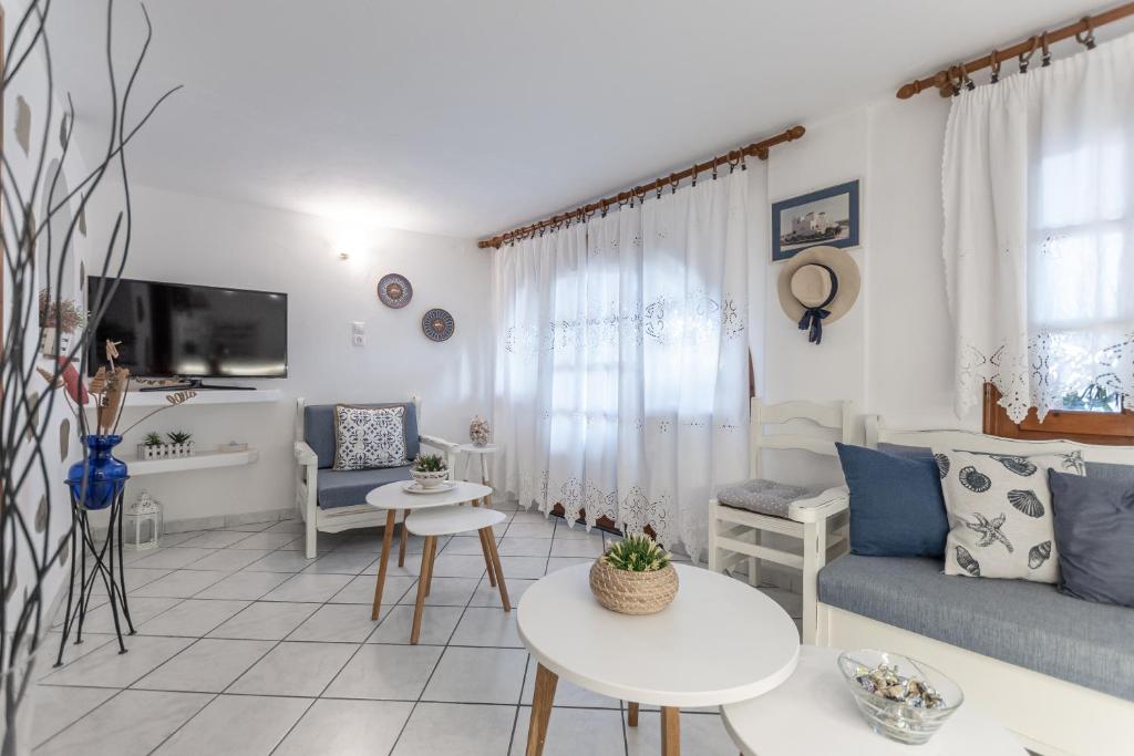 TV a/nebo společenská místnost v ubytování Zanneta Apartments & Suites