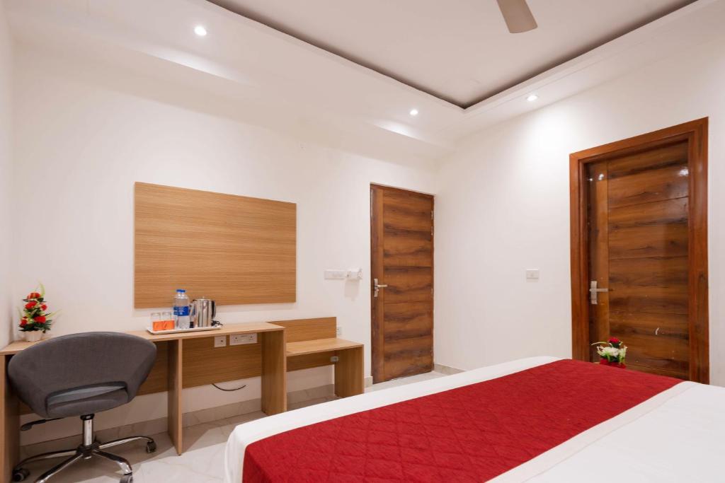Postel nebo postele na pokoji v ubytování Octave Nirvana Suites