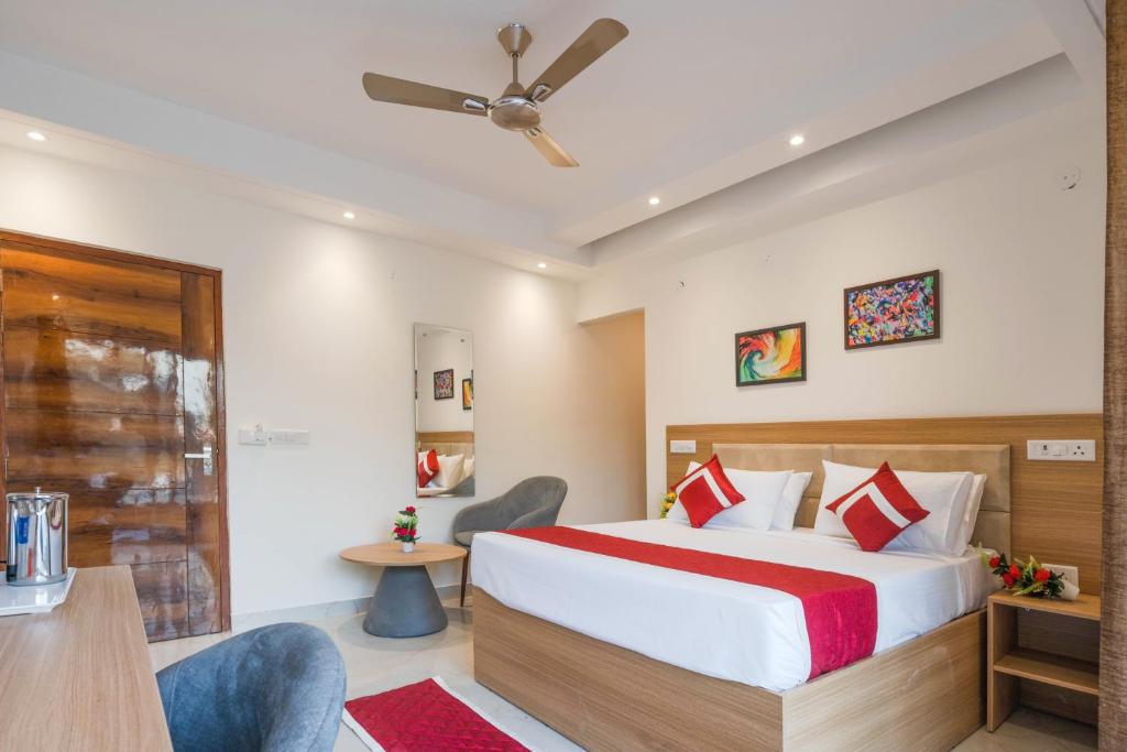Postel nebo postele na pokoji v ubytování Octave Nirvana Suites