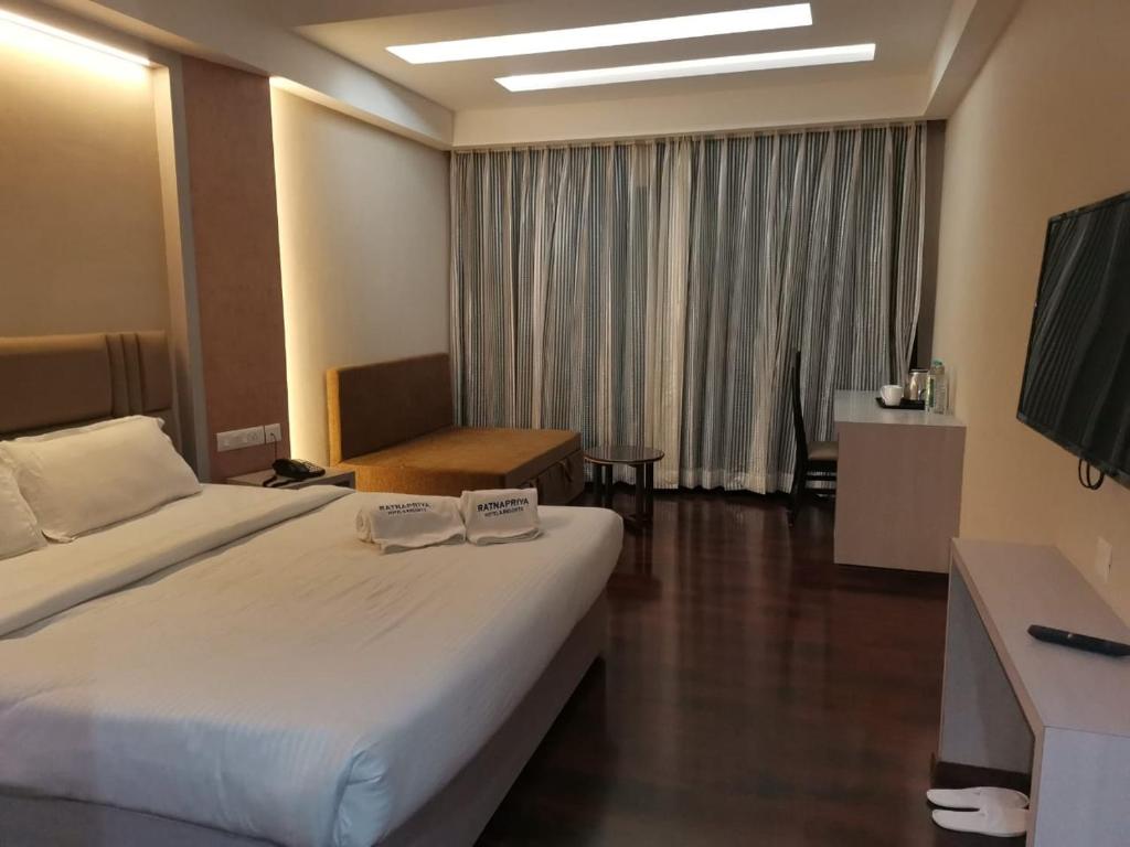 Ratnapriya hotel and resort - Habitación Doble Con Cama Extra
