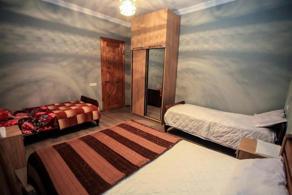 Postel nebo postele na pokoji v ubytování Guest House In Tbilisi