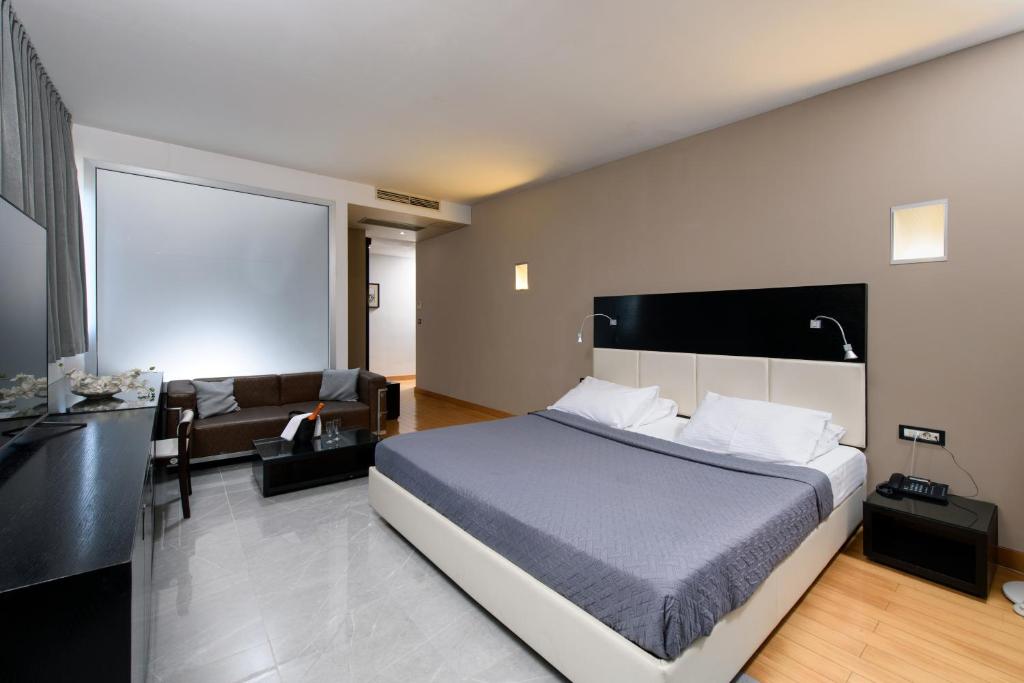 Posteľ alebo postele v izbe v ubytovaní Hotel San Antonio