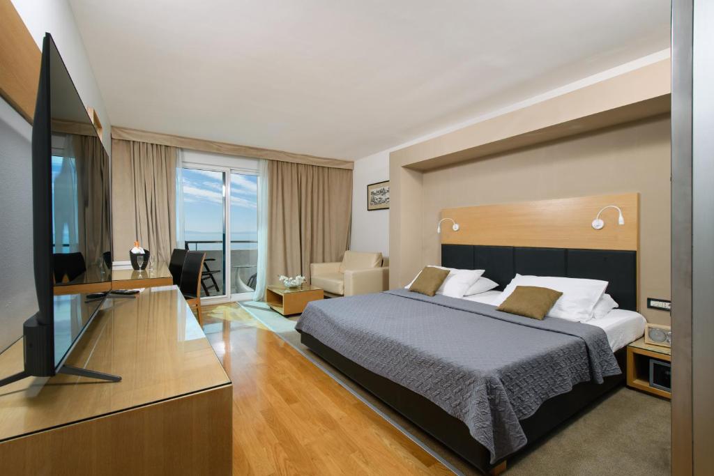 Posteľ alebo postele v izbe v ubytovaní Hotel San Antonio