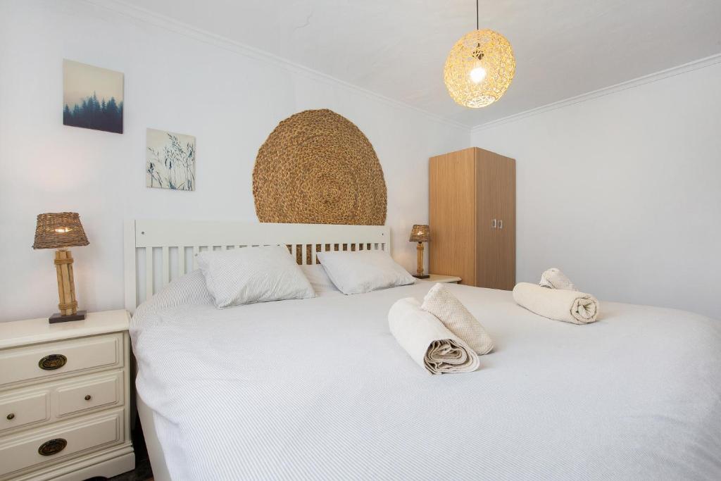 A bed or beds in a room at El Cotillo Mar Beach