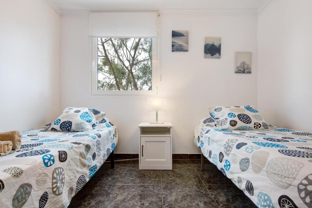 A bed or beds in a room at El Cotillo Mar Beach