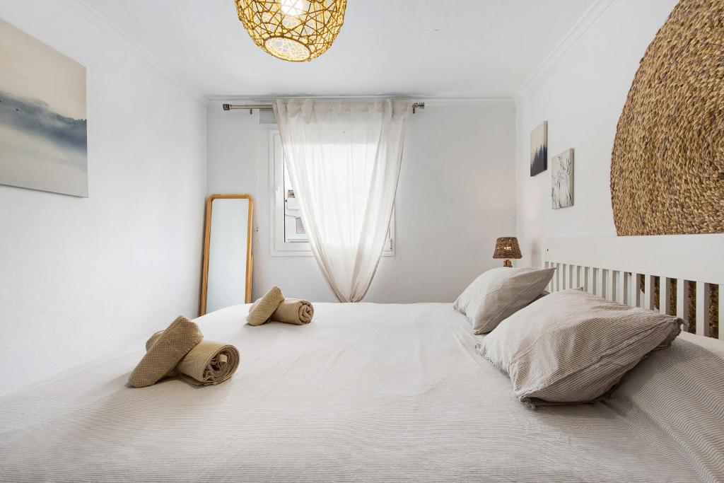 A bed or beds in a room at El Cotillo Mar Beach