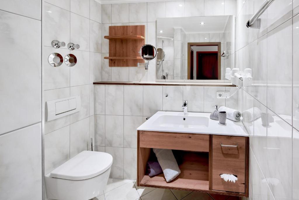 Koupelna v ubytování Maximilian Appartements