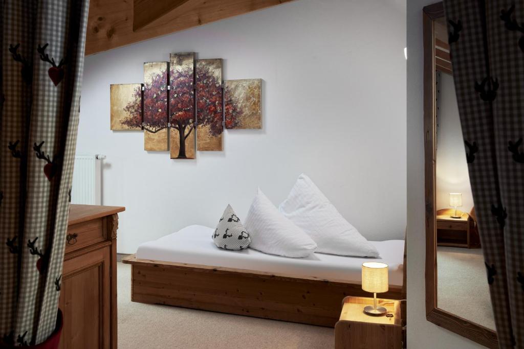 Postel nebo postele na pokoji v ubytování Maximilian Appartements