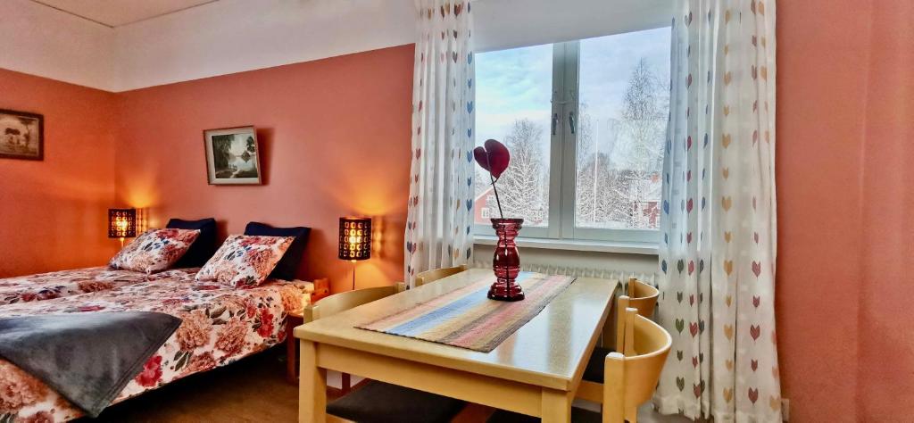 Postel nebo postele na pokoji v ubytování Kronlund Kursgård