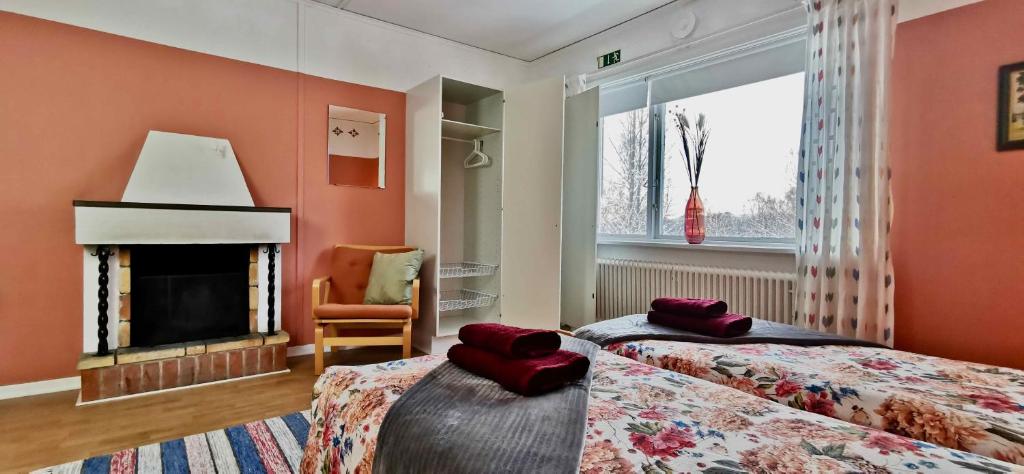 Postel nebo postele na pokoji v ubytování Kronlund Kursgård