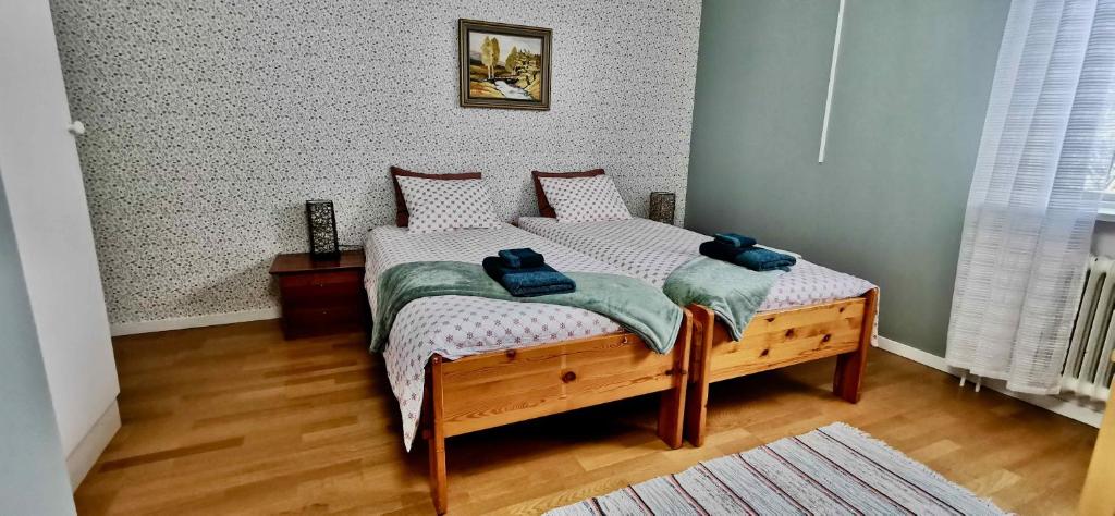 Postel nebo postele na pokoji v ubytování Kronlund Kursgård