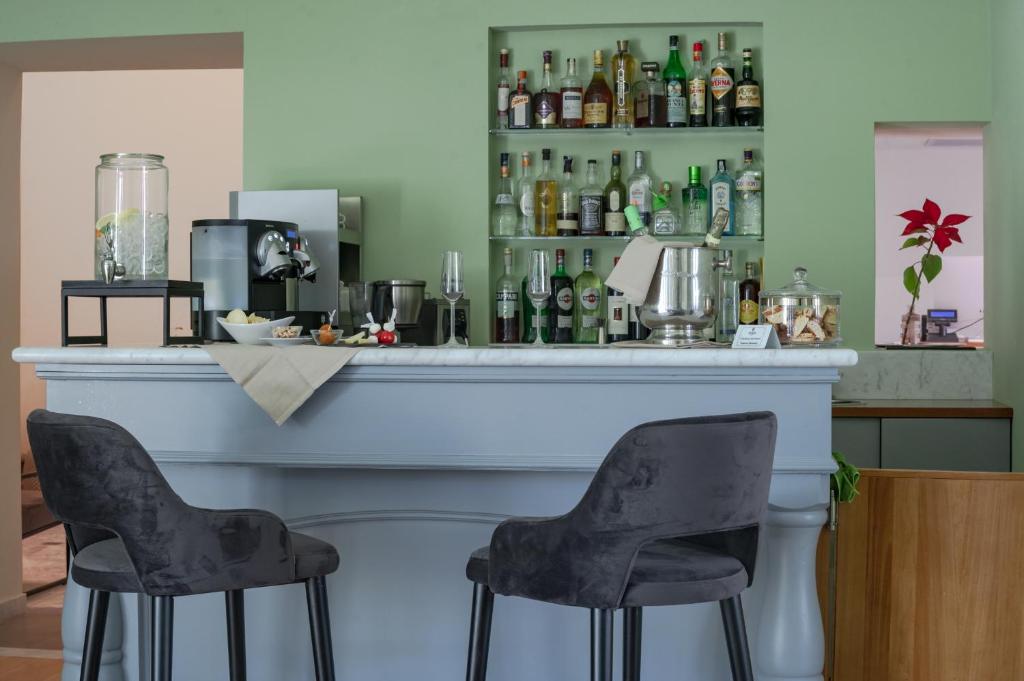Nápoje v ubytování Hotel Ariele